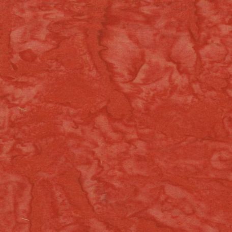 Tissu batik marbré orange rouge tomate