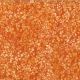 Tissu Batik orange cuivré avec feuillage